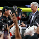 Pac-12 commissioner George Kliavkoff, right, thinks scheduling college football games nine years in advance is bananas. He’s right.